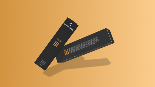 Two black boxes with gold text on a beige background